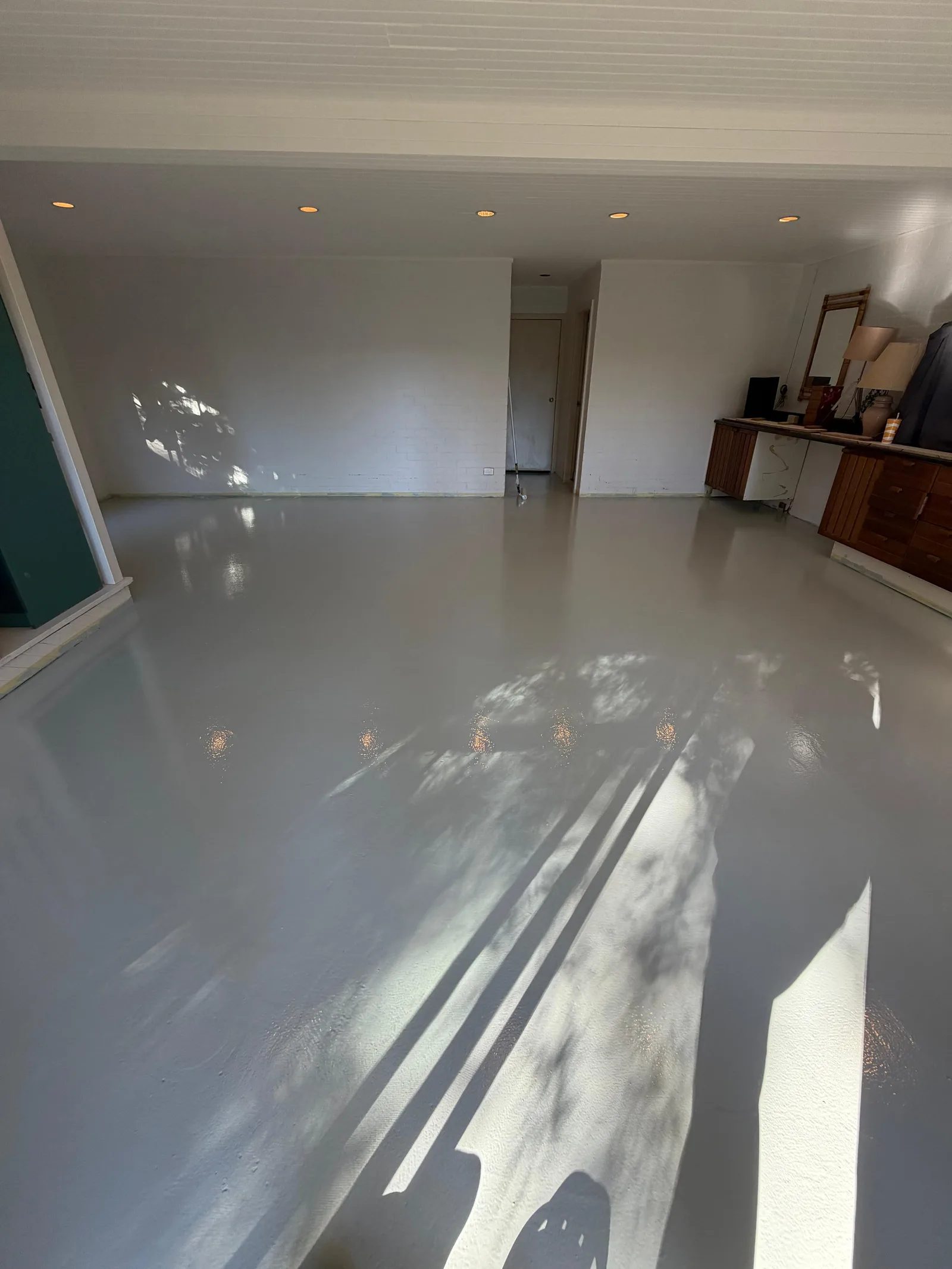 Light grey solid colour epoxy kitchen and dining floor — Inner West Sydney