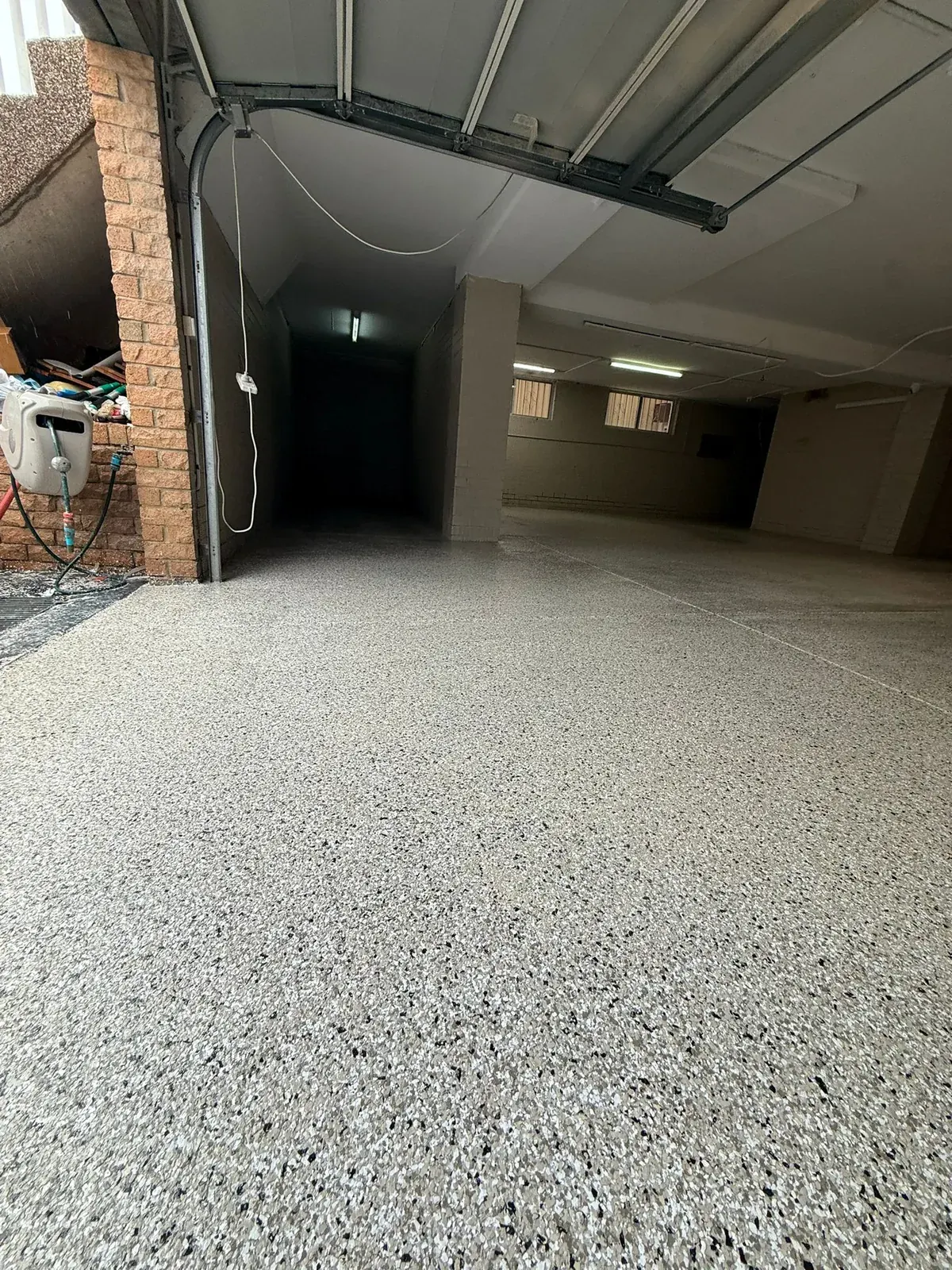 Prepped commercial warehouse floor showing levelled substrate ready for coating — King of Seal Sydney